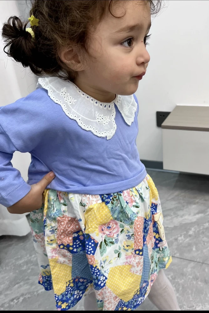 Ткань очень мягкая, плотный трикотаж, швы ровные, очень красивый воротничок.